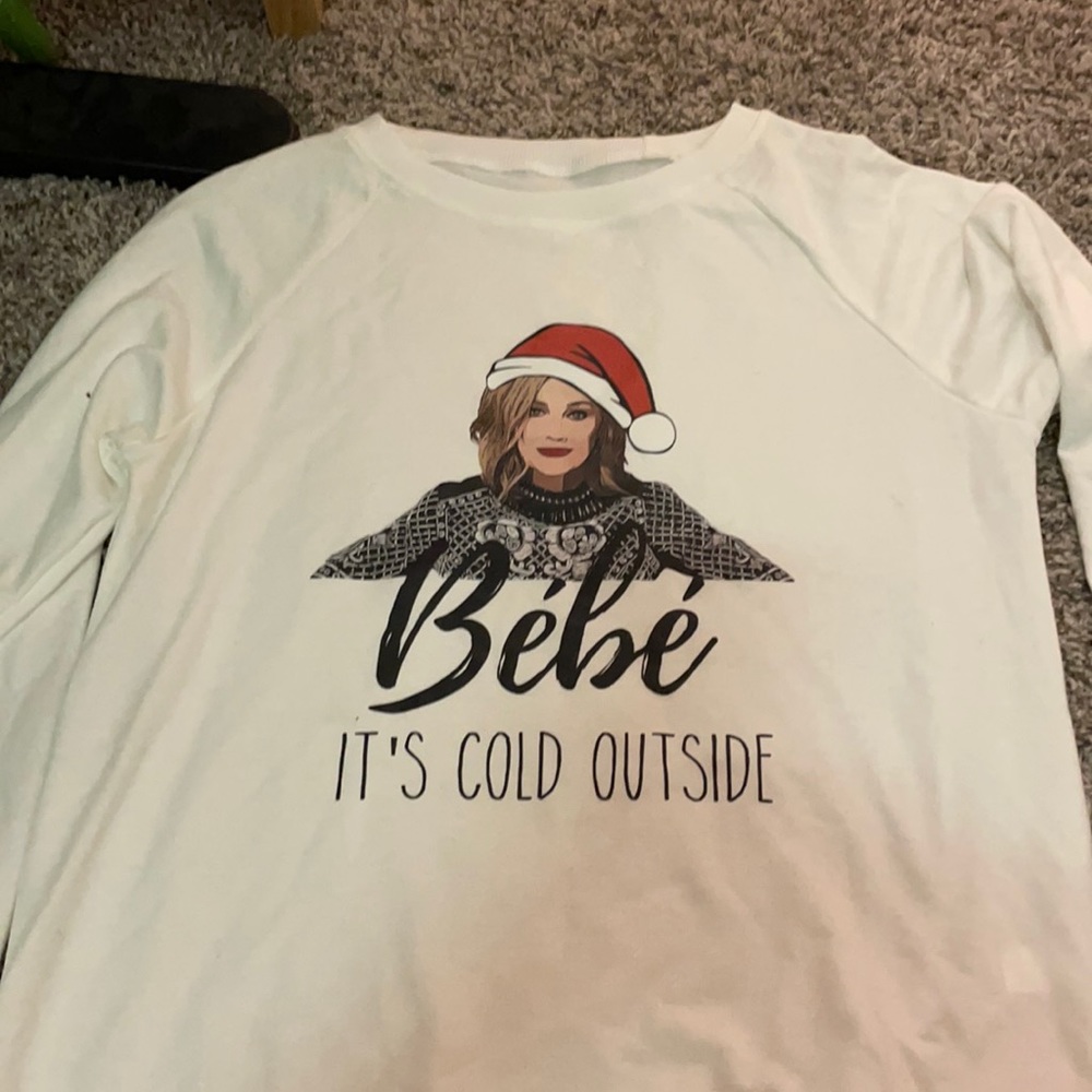 Schitt’s Creek novelty Holiday sweatshirt.